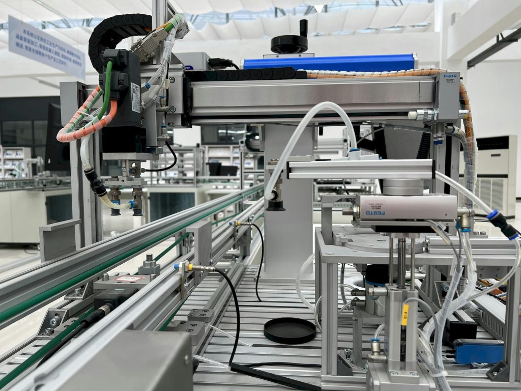 Close-up view of modern automation machinery in an industrial setting.